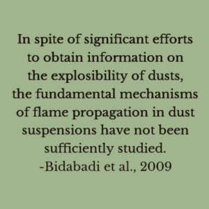 Quote describing challenges in determining the fundamental properties of dust flames 