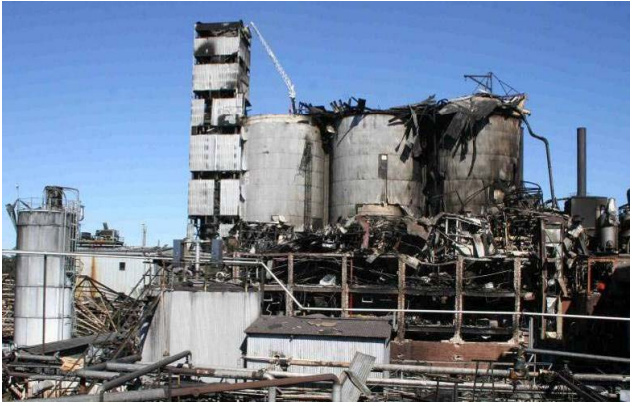 Destruction to three sugar storage silos at Imperial Sugar