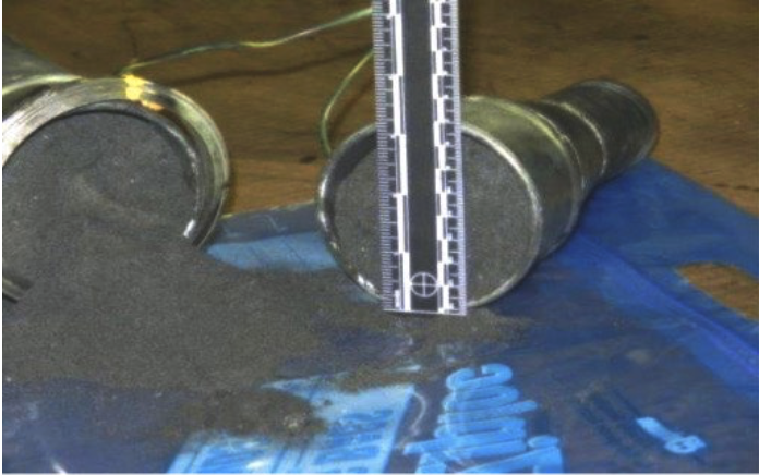 Figure 3: Vacuum housecleaning ducts plugged with Carbon Black and Gilsonite from ink dust production. Source: US Chemical Safety Board Final Report